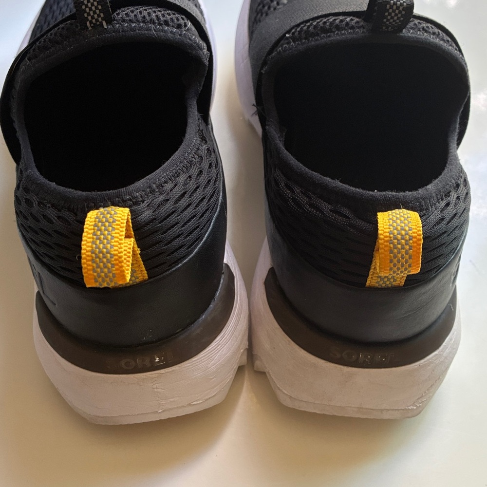 Sorel Women’s Kinetic Impact, Black and White Slip-On Sneakers - Picture 6 of 9
